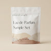 A stand-up pouch package labeled 'coast + salt' and 'Eau de Parfum Sample Set' on a warm beige background.