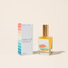 Perfume bottle and packaging labeled 'Sunset Sorbet' on a beige background